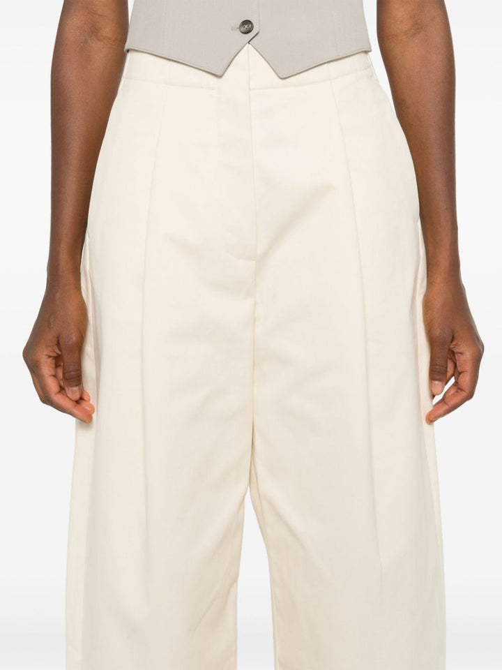 STUDIO NICHOLSON Trousers Beige