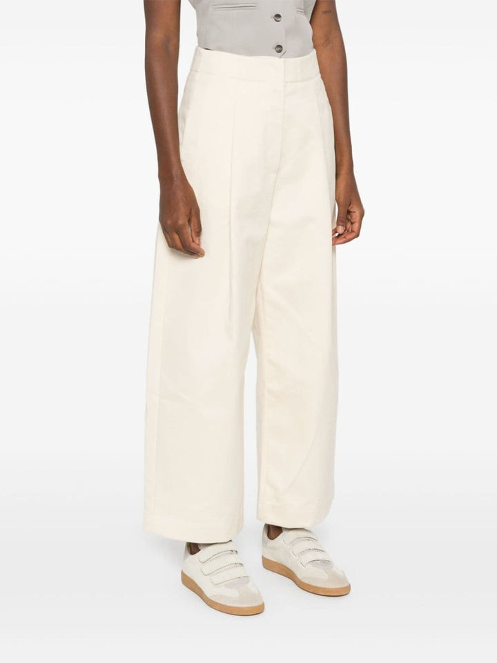 STUDIO NICHOLSON Trousers Beige